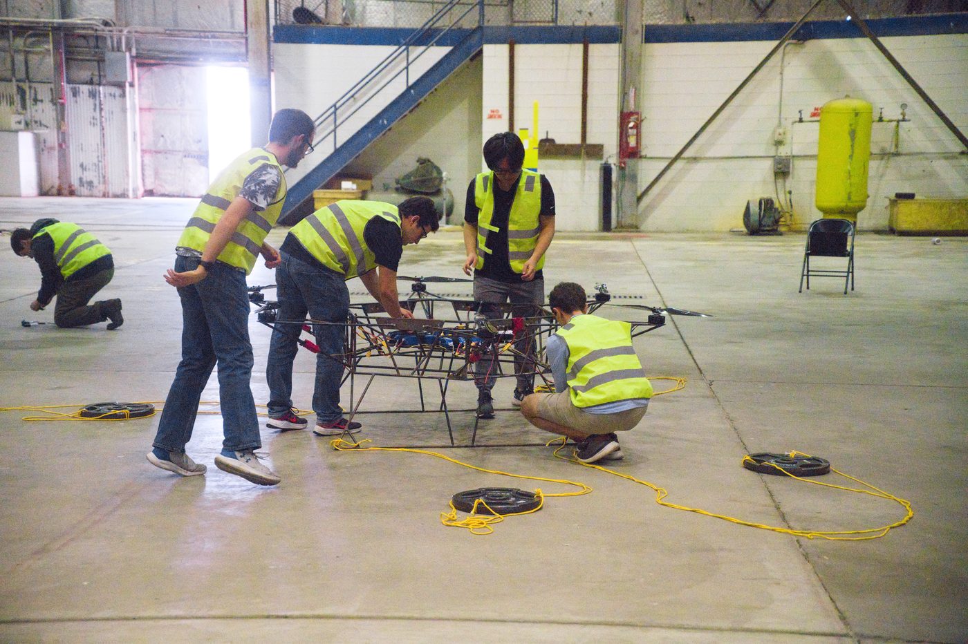 The BoilerUP team working on the aircraft