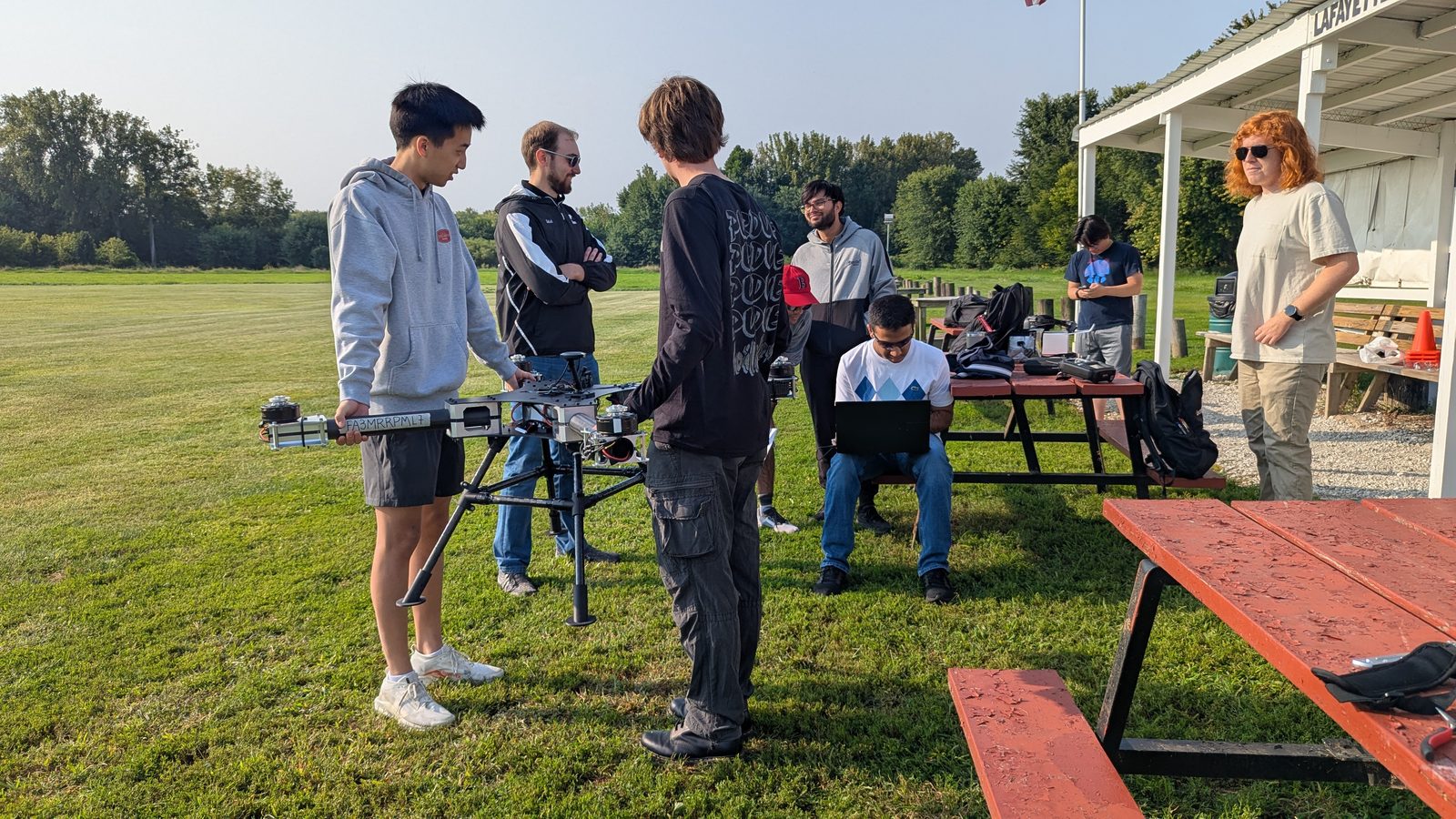 The VFS team calibrating a prototype at the flight field